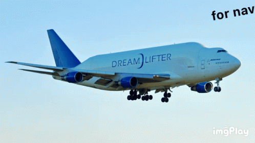 A Dream Lifter Plane Is Taking Off From An Airport Runway GIF