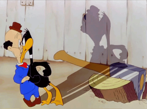 A Duck And A Man Standing Next To Each Other GIF