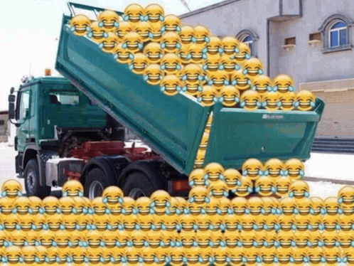 A Dump Truck Is Filled With Smiley Faces And Tears Of Laughter GIF