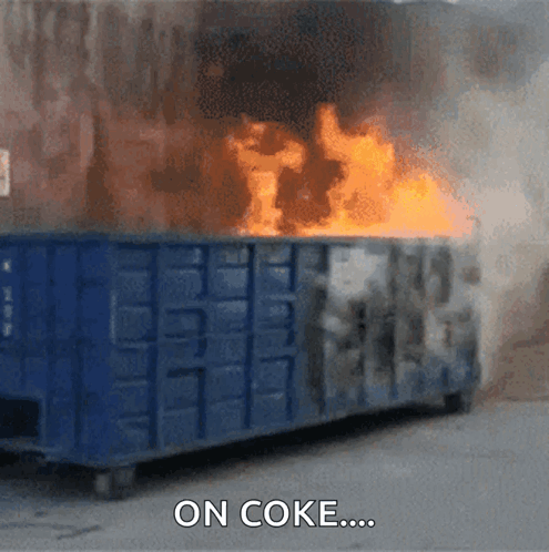 A Dumpster Is On Fire With The Words " On Coke " Above It GIF