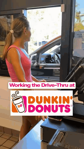 A Dunkin Donuts Advertisement With A Woman Standing In Front Of A Window GIF