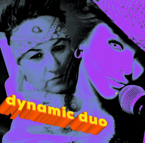 A Dynamic Duo Poster With Two Women And A Microphone In The Foreground GIF