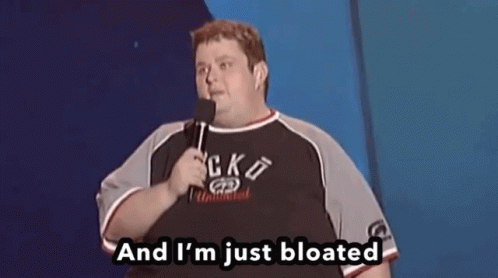A Fat Man Is Holding A Microphone And Saying And I 'M Just Bloated GIF