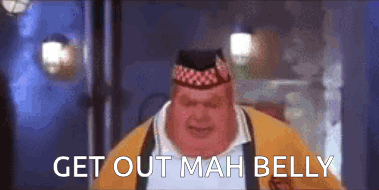 A Fat Man Wearing A Hat And A Yellow Jacket Is Standing In A Room And Says Get Out Mah Belly . GIF