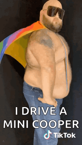 A Fat Man Wearing Sunglasses And A Rainbow Cape Says I Drive A Mini Cooper Tiktok GIF