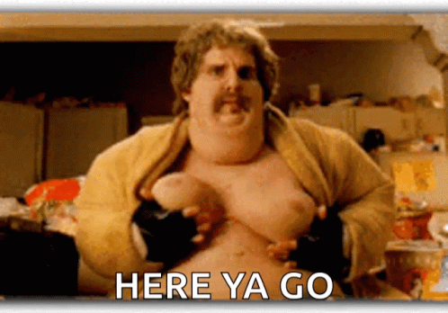 A Fat Man With A Mustache Is Holding His Chest With The Words Here Ya Go Written Below Him GIF