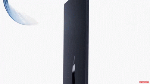 A Feather Is Flying In The Air Next To A Black Box With The Apple Logo On It GIF