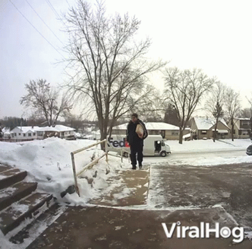 A Fedex Truck Is Parked On The Side Of The Road GIF