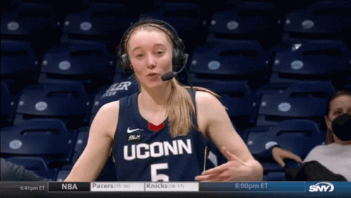 A Female Basketball Player From Uconn Is Wearing Headphones GIF