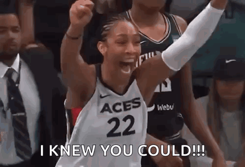 A Female Basketball Player Is Raising Her Fist In The Air And Says `` I Knew You Could ! '' GIF