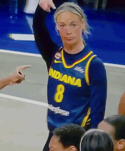 A Female Basketball Player Wearing A Blue Indiana 8 Jersey GIF