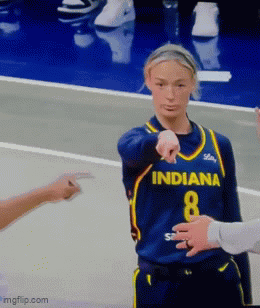 A Female Basketball Player Wearing A Blue Jersey With The Number 8 On It GIF