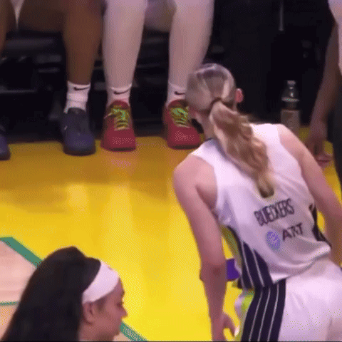 A Female Basketball Player Wearing A Jersey That Says Bugeyes GIF