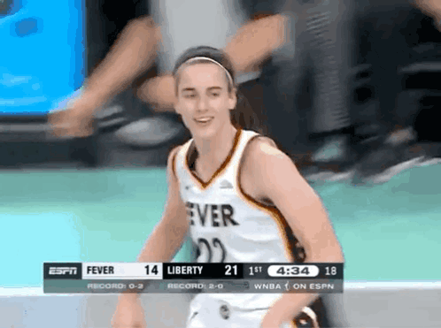 A Female Basketball Player Wearing A Jersey That Says Fever GIF