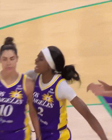 A Female Basketball Player Wearing A Jersey That Says Los Angeles On It GIF