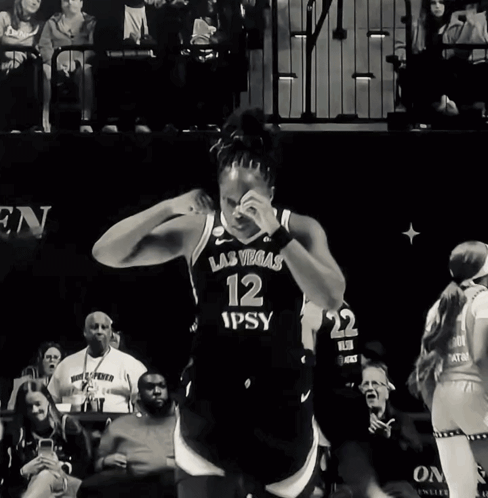 A Female Basketball Player Wearing A Las Vegas Number 12 Jersey GIF