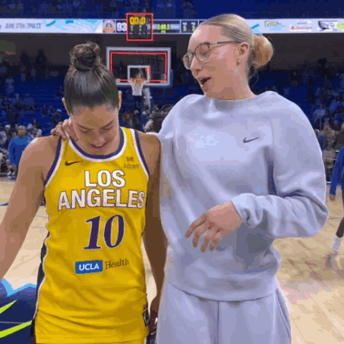 A Female Basketball Player Wearing A Los Angeles Number 10 Jersey GIF