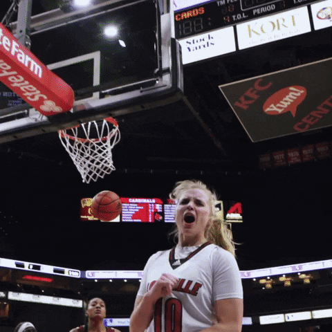 A Female Basketball Player Wearing A Number 10 Jersey GIF