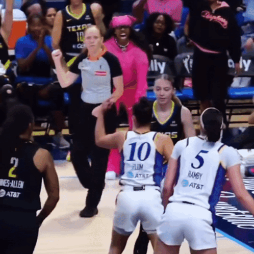 A Female Basketball Player Wearing A Number 10 Jersey GIF