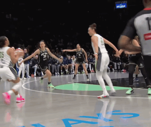 A Female Basketball Player Wearing A Number 30 Jersey GIF