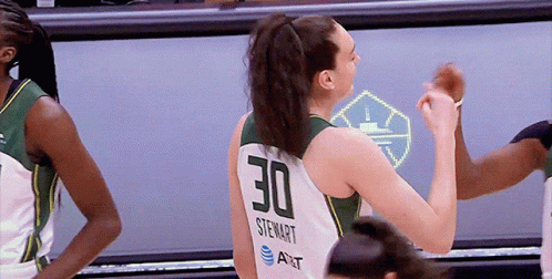 A Female Basketball Player Wearing A Number 30 Jersey GIF