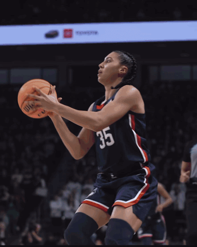 A Female Basketball Player Wearing A Number 35 Jersey GIF
