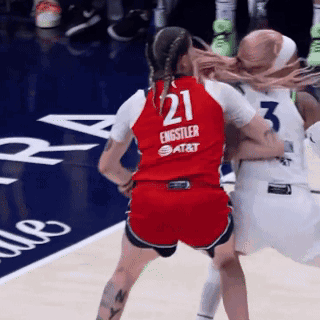 A Female Basketball Player Wearing A Red Jersey With The Number 21 On It GIF