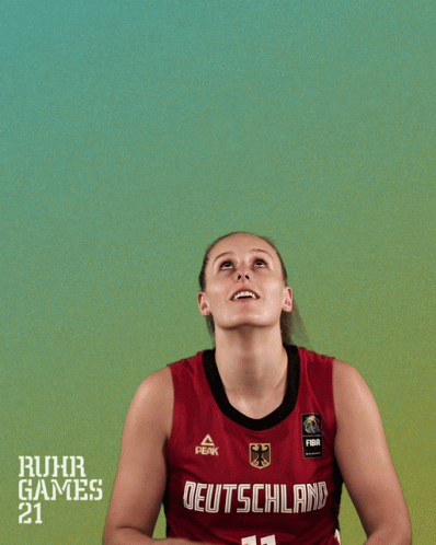 A Female Basketball Player With The Number 11 On Her Jersey Shoots The Ball GIF