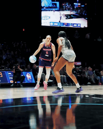 A Female Basketball Player With The Number 8 On Her Shirt GIF