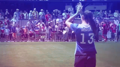 A Female Soccer Player Wearing A Number 13 Jersey GIF