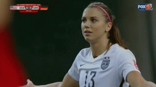 A Female Soccer Player With The Number 13 On Her Shirt GIF