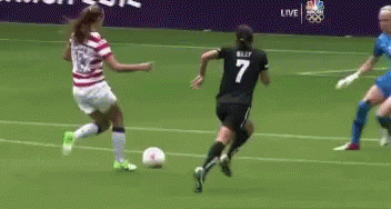 A Female Soccer Player With The Number 7 On Her Jersey Is Running Towards The Ball GIF