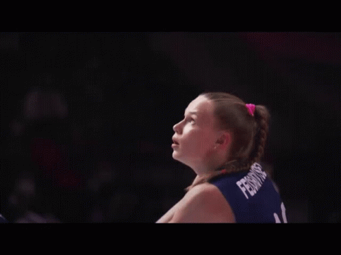 A Female Volleyball Player Wearing A Number 11 Jersey GIF