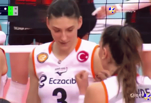A Female Volleyball Player Wearing A Number 3 Jersey GIF