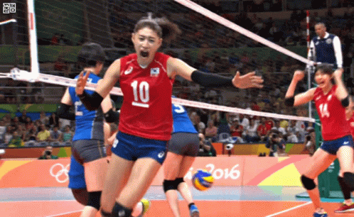 A Female Volleyball Player With The Number 10 On Her Shirt GIF