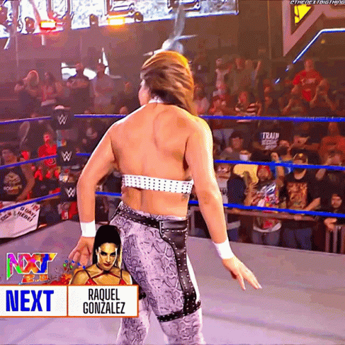 A Female Wrestler Named Raquel Gonzalez Is Dancing In A Ring GIF