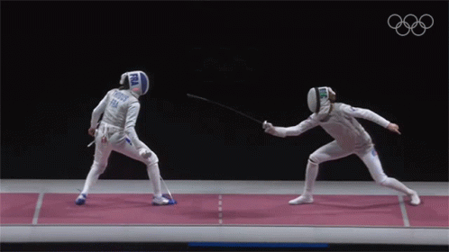 A Fencer Wearing A Helmet With The Word Fra On It Is Fighting Another Fencer GIF