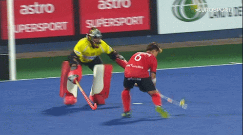 A Field Hockey Game Is Being Played In Front Of An Astro Supersport Sign GIF