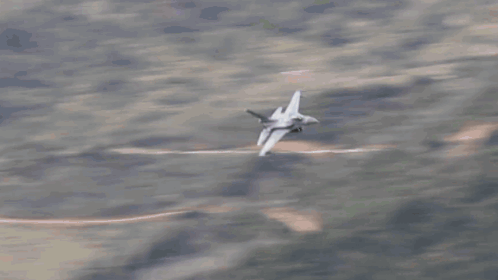 Fighter Jet Flying With Smoke Trail GIF