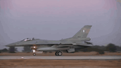 A Fighter Jet Is Taking Off From A Runway And Has The Letter I On The Tail GIF