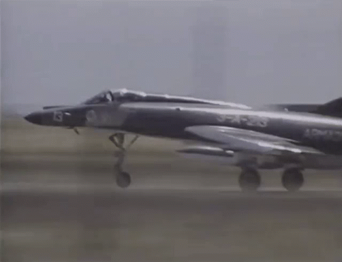 A Fighter Jet With The Number 3-1-23 On The Side GIF