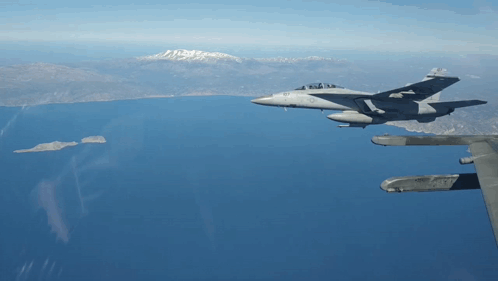 A Fighter Jet With The Number 97 On The Side GIF