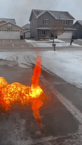 A Fire Is Coming Out Of A Hole In The Ground GIF