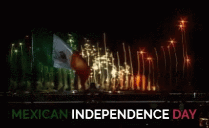 A Fireworks Display For Mexican Independence Day With A Flag In The Background GIF