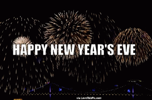 A Fireworks Display With The Words Happy New Year 'S Eve In White Letters GIF