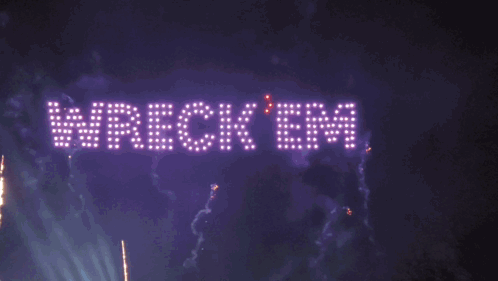 A Fireworks Display With The Words Wreck Em Fc Written In Lights GIF