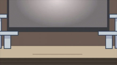 A Flat Screen Tv Is Sitting On A Wooden Table In A Room GIF