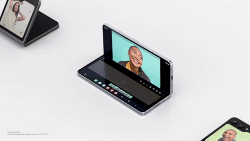 A Folding Phone With A Picture Of A Woman On It GIF