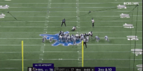 a football field with cbs sports written on the bottom