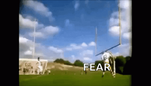 A Football Field With The Word Fear On The Bottom GIF